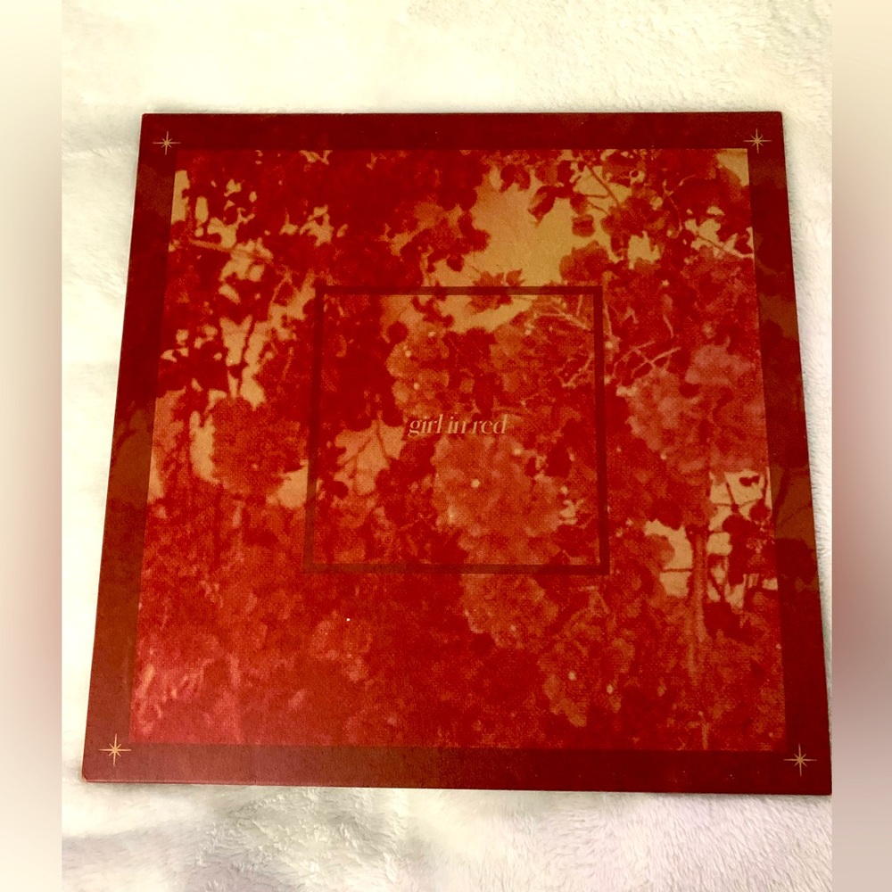 Girl in red vinyl